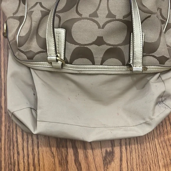 Gold coach purse